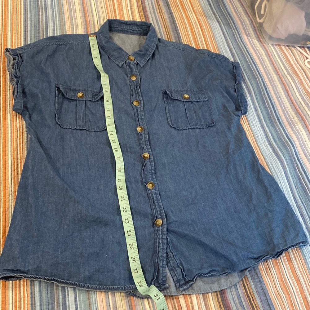 Women’s large button up. Jean in color